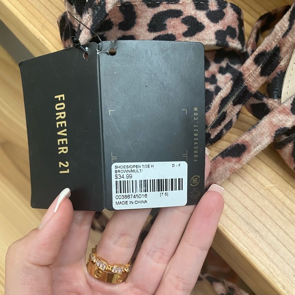 Size 7 1/2, strap up, suede cheetah print stilettos. - Picture 2 of 5